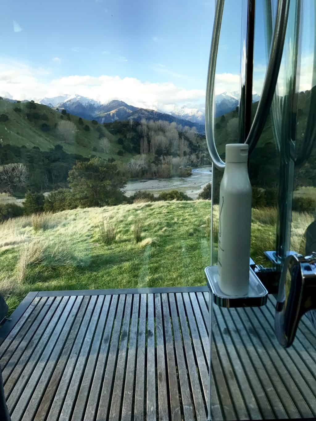 View over Kahutara farm from the shower box (c) Jacqui Gibson. FWT Magazine.