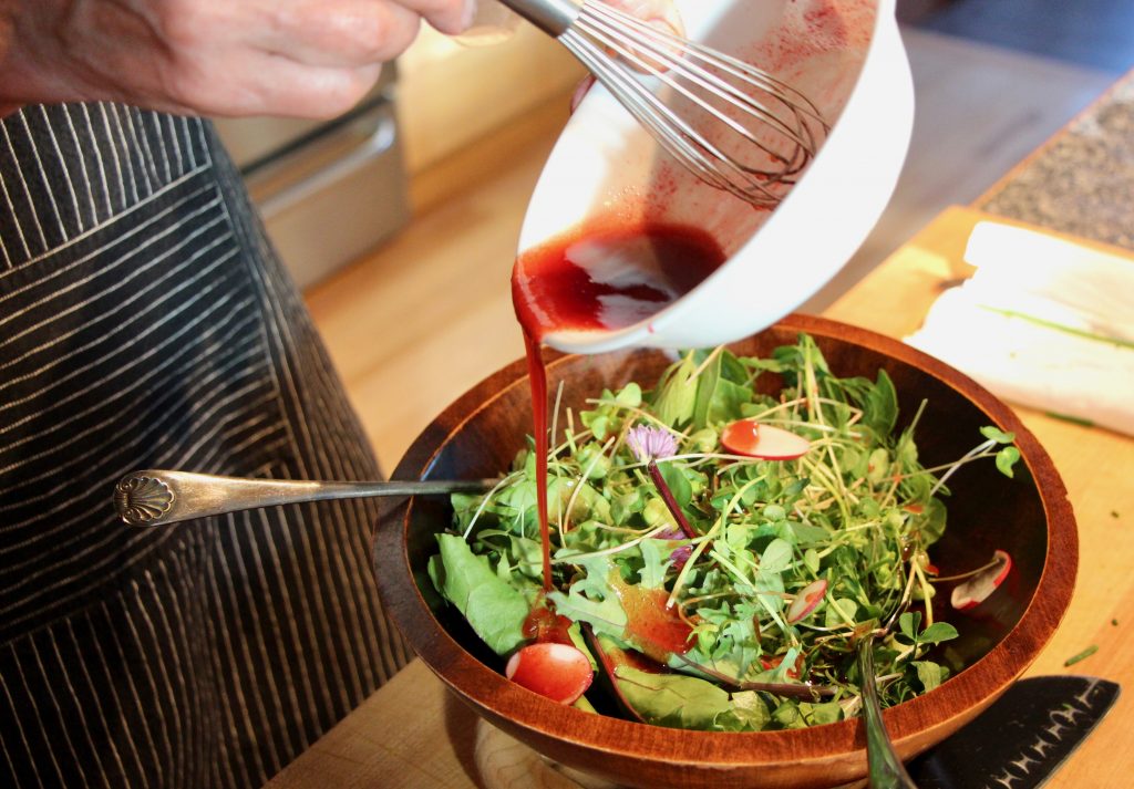 A combination of birch syrup and olive oil is used to dress the green salad © Christine Salins
