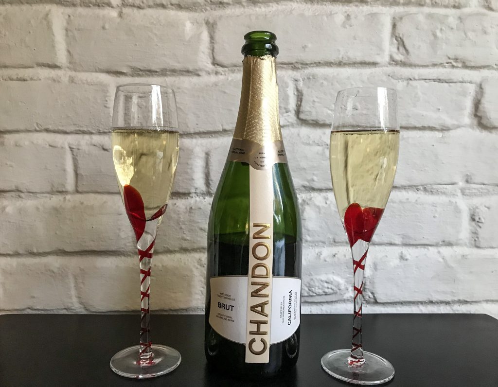 Bottle of Chandon sparkling wine and two glasses
