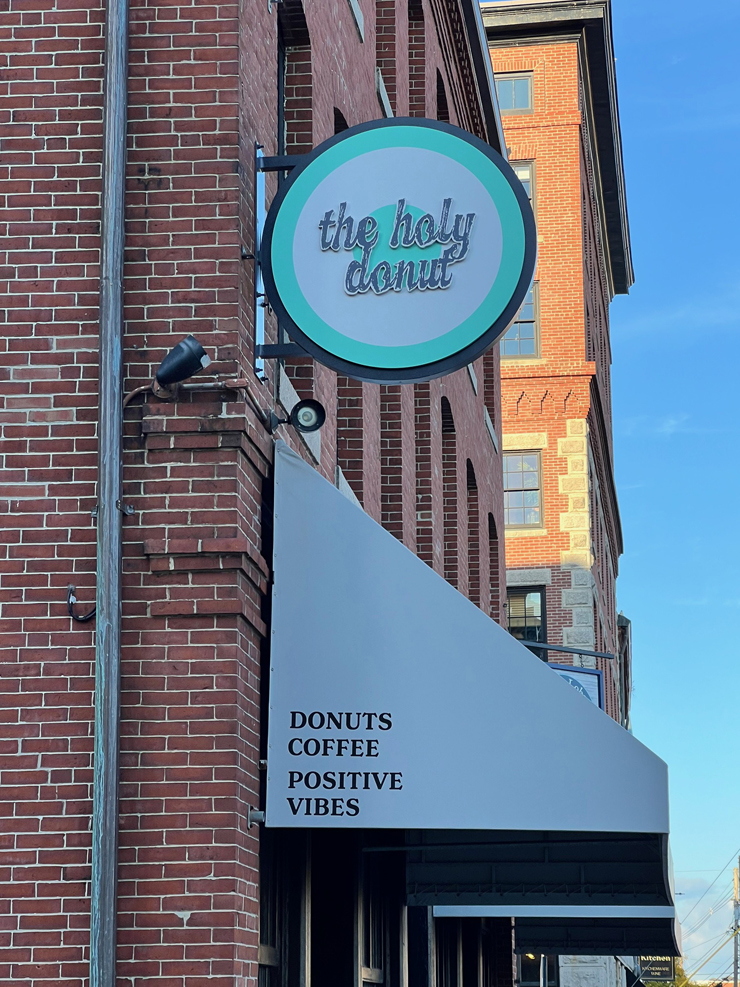 Sign for The Holy Donut
