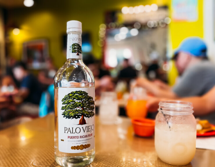 A bottle of Palo Viejo Puerto Rican rum on a table at Deaverdura restaurant in Old San Juan.