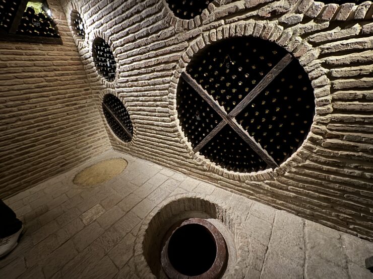 Wine storage and buried qvevri before filling in Kerovani marani (wine cellar)