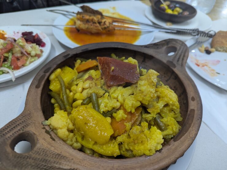Chicken tagine with quince, preserved lemon, cauliflower and green and white beans.