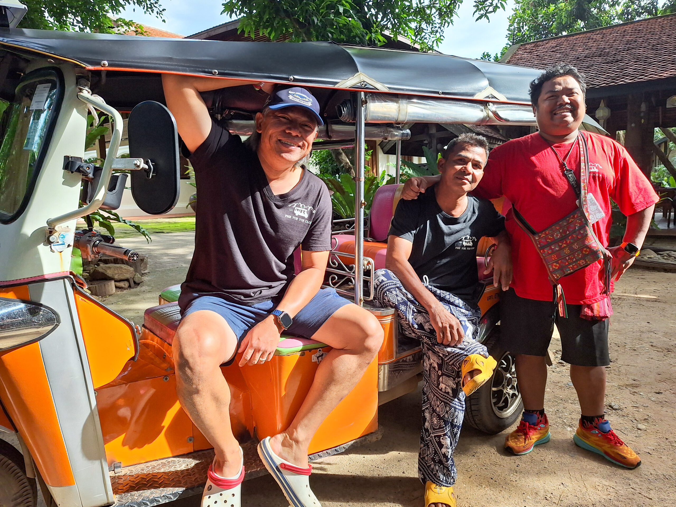 Three Tuk Tuk Club guides with Tuk Tuk