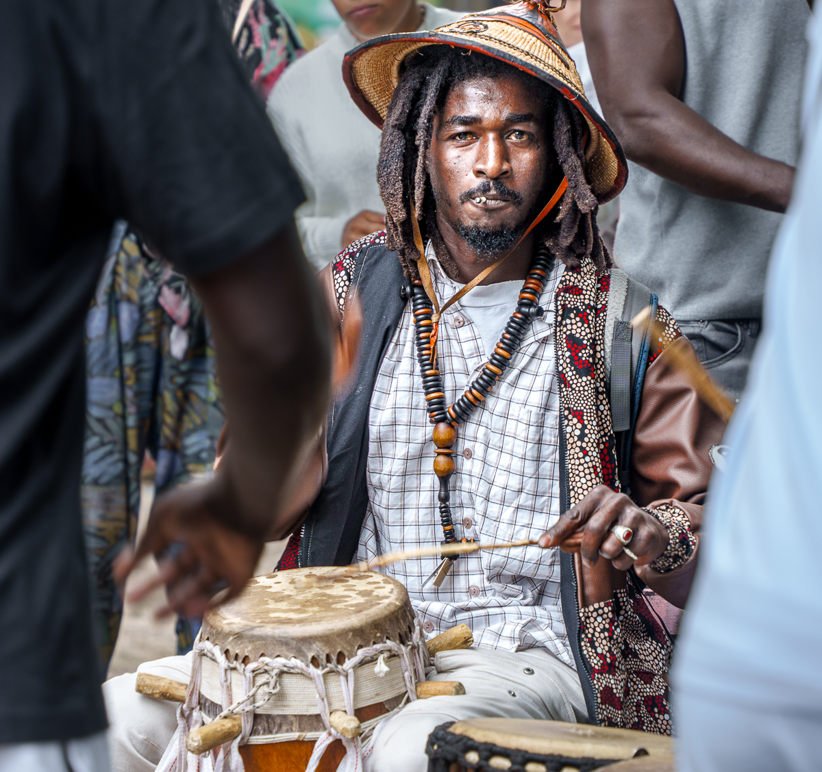 Man Beating a Drum. Finding the Beat Best In Show in IFWTWA 2025 Photo Contest