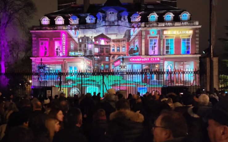 building illuminated with colorful video lights