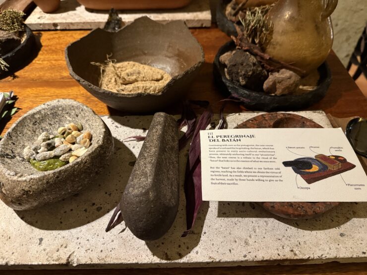 A dish at Clan in Arequipa lets diners know the history of each dish with illustrated index cards. Here, we are encouraged to use a traditional stone pestle called a batan to make a chunky peanut sauce for one dish.