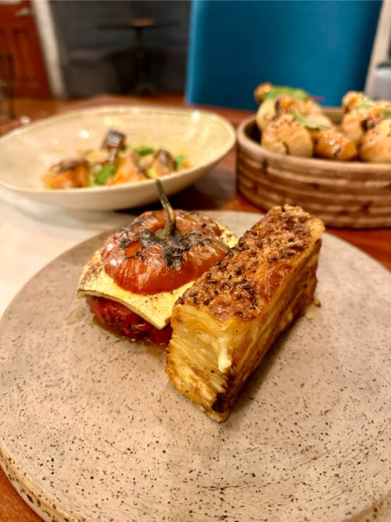 Arequipa is famous for rocoto relleno, baked red rocoto pepper stuffed with flavorful ground beef and lots of cheese that is served with pastel de papas, a multilayered, cheesy potato galette.