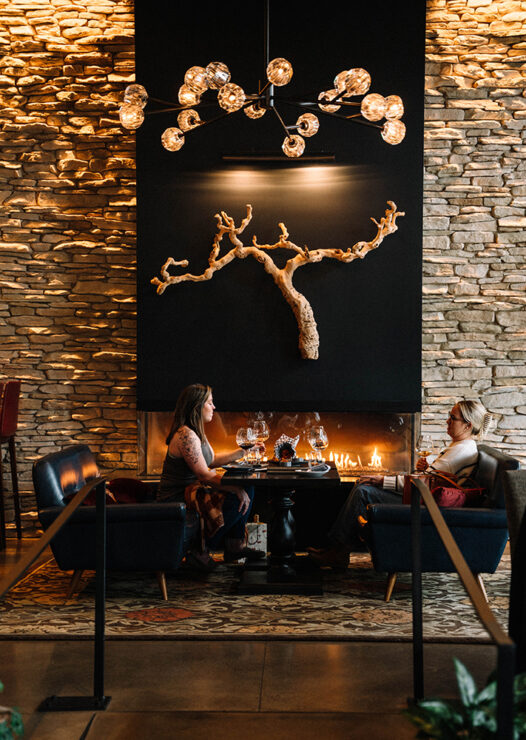 Guest enjoying wine at Domaine Serene Wine Lounge, Lake Oswego