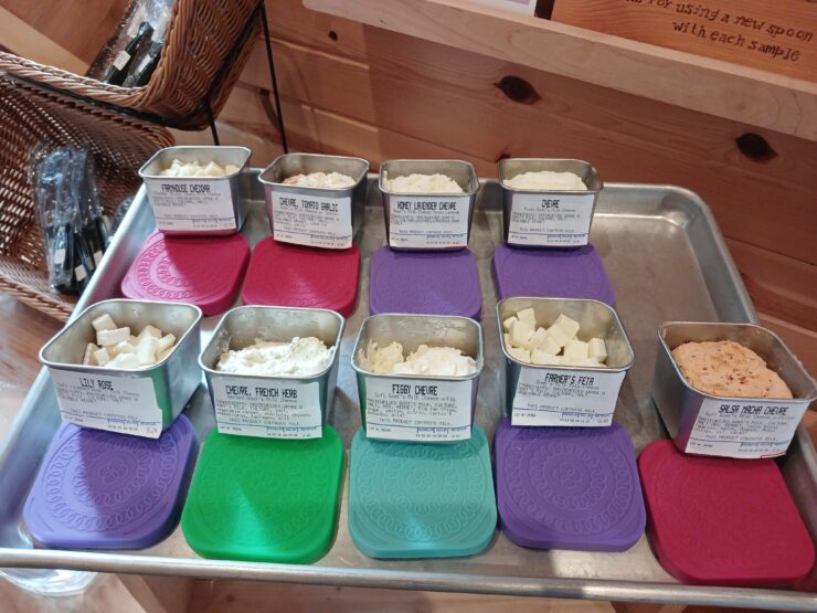 Selection of goat cheeses in small metal bowls