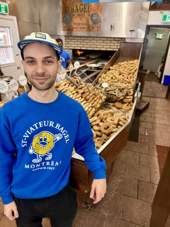 Ben Choquette, director of marketing at St-Viateur Bagel in a signature t-shirt that appeared in Heated Rivalry ©Linda Barnard