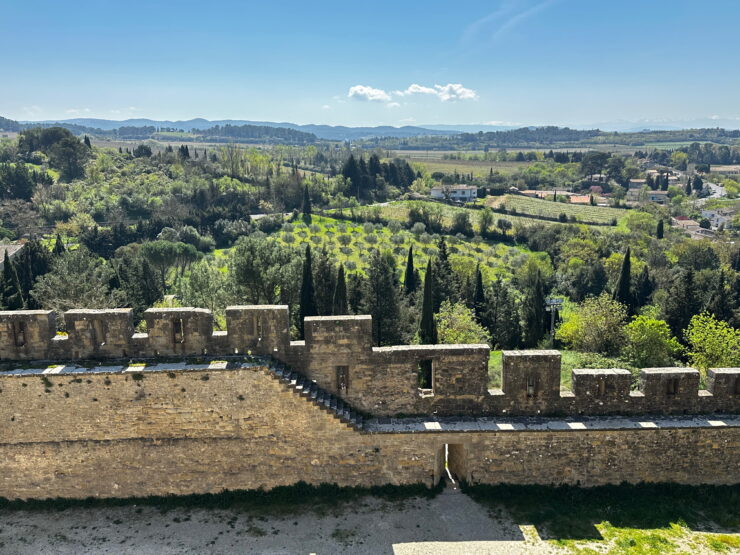 view over the ramparts to the green fields and hills beyond