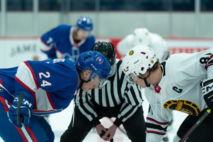 Two hockey players face off in the series Heated Rivalry. ©Bell Media photo