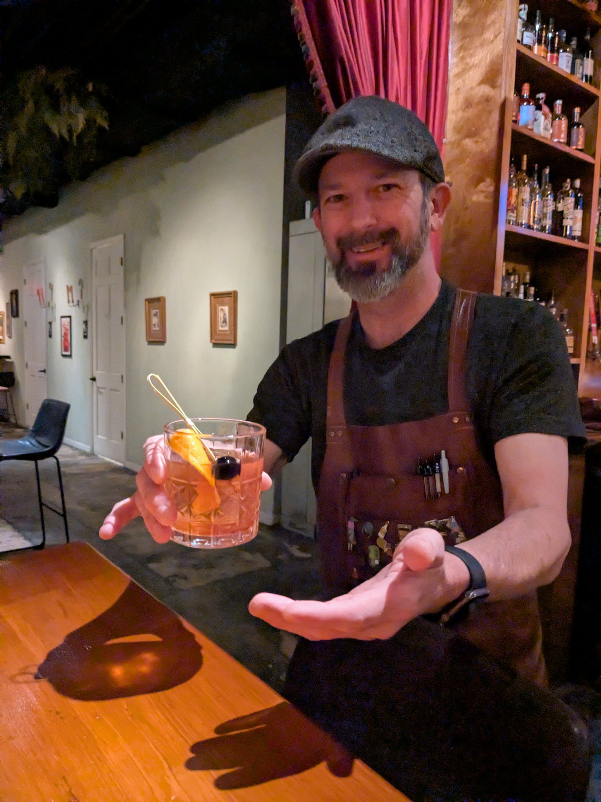 Bartender with a Duckfat Old Fashioned at Revival