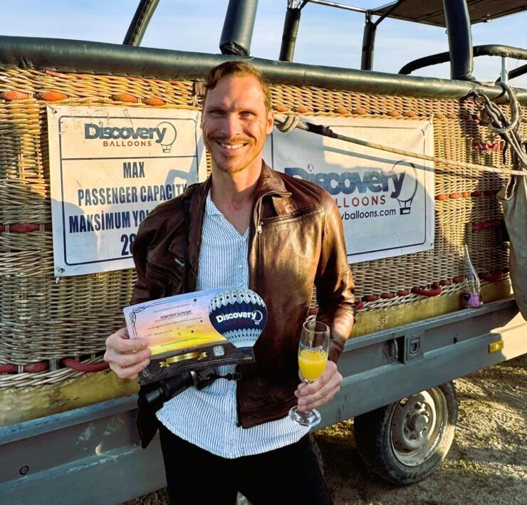 Ryan with his flight certificate © Joelle Machia