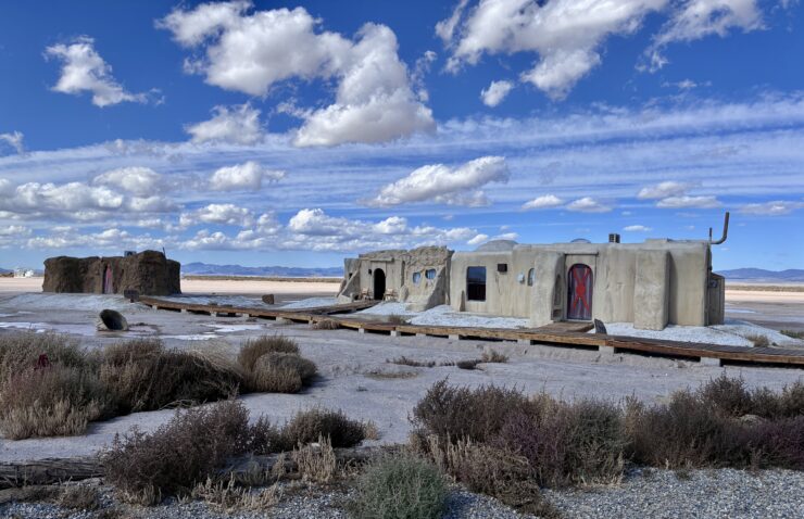 Guests at Outpost X can choose among five above ground cave-like structures for quite luxurious glamping lodging. ©Julia Bayly