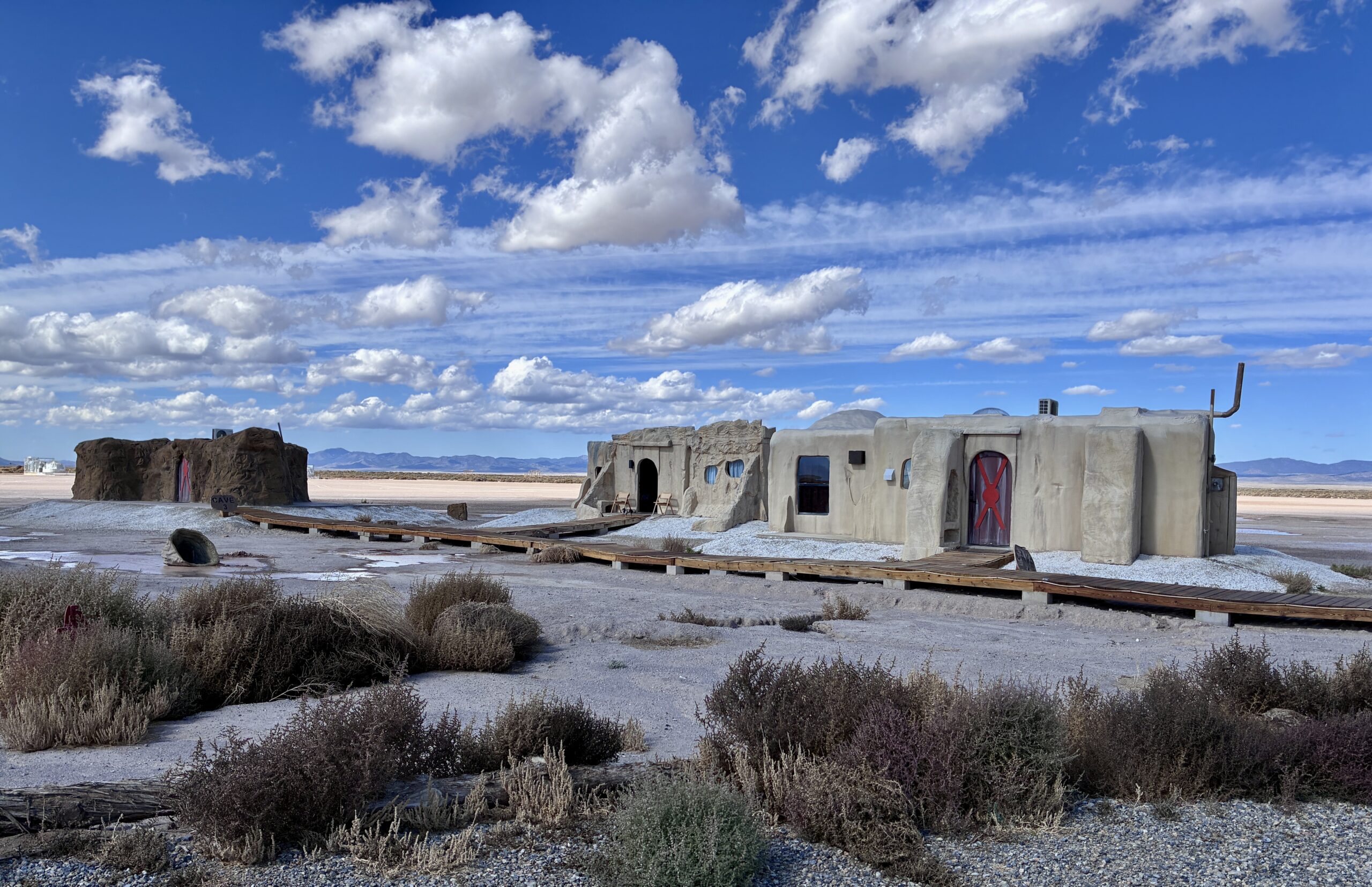 Guests at Outpost X can choose among five above ground cave-like structures for quite luxurious glamping lodging. ©Julia Bayly