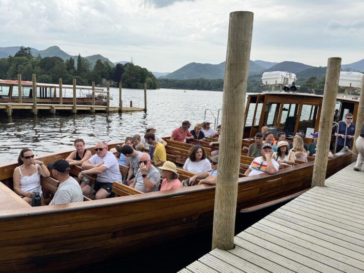 Derwentwater, near Keswick - a wooden craft filled with passengers for a 50-minute boat trip.