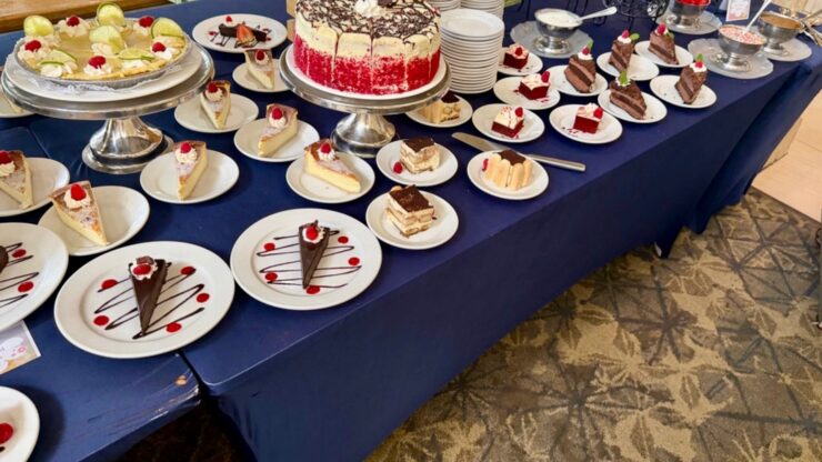 Sunday brunch buffet with small plated dishes arranged on a long table at Mission Resort + Club in Howey-in-the-Hills, Florida.
