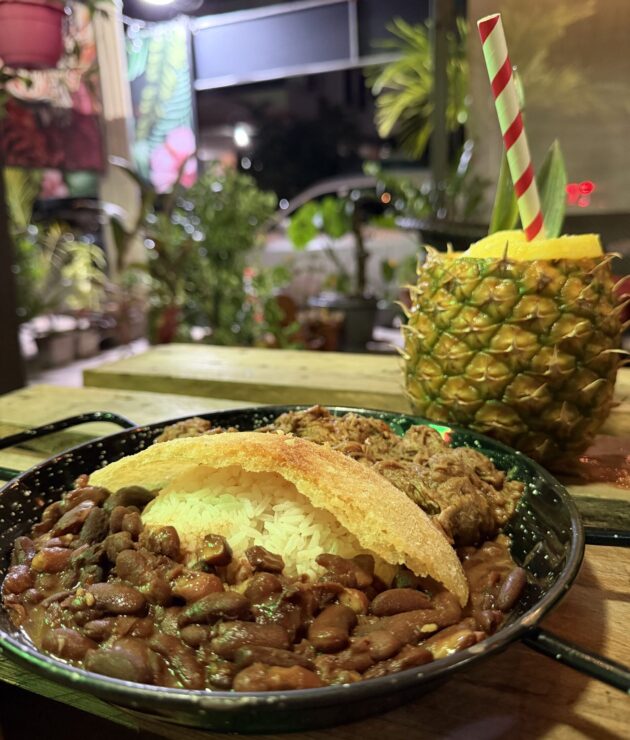 Meal with pineapple drink and concolon in panama city