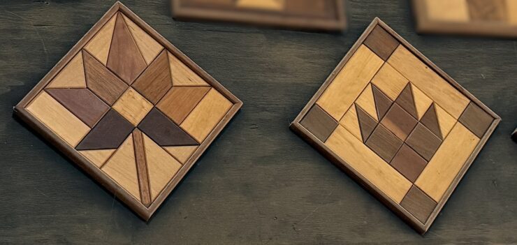 The image shows some hand-cut and handmade wooden decor from Teaberry Woodworking.