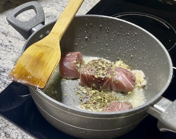 flavors of Oman - fresh za'atar and garlic go on the tuna first