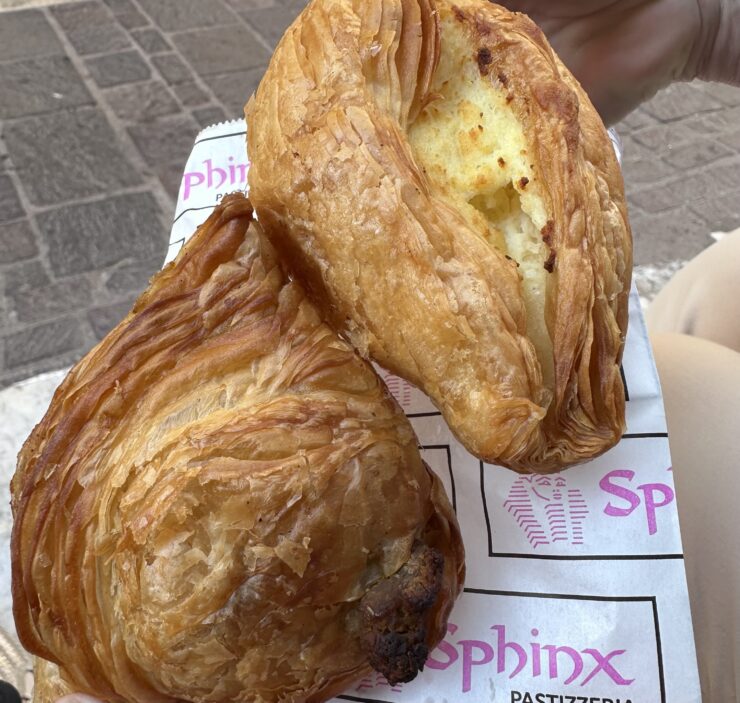 Malta's famous Pastizzi are crispy baked pastries filled with savory ricotta cheese or curried, mashed peas.