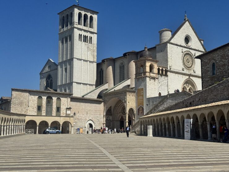 light grey stone basilica against a blue sky