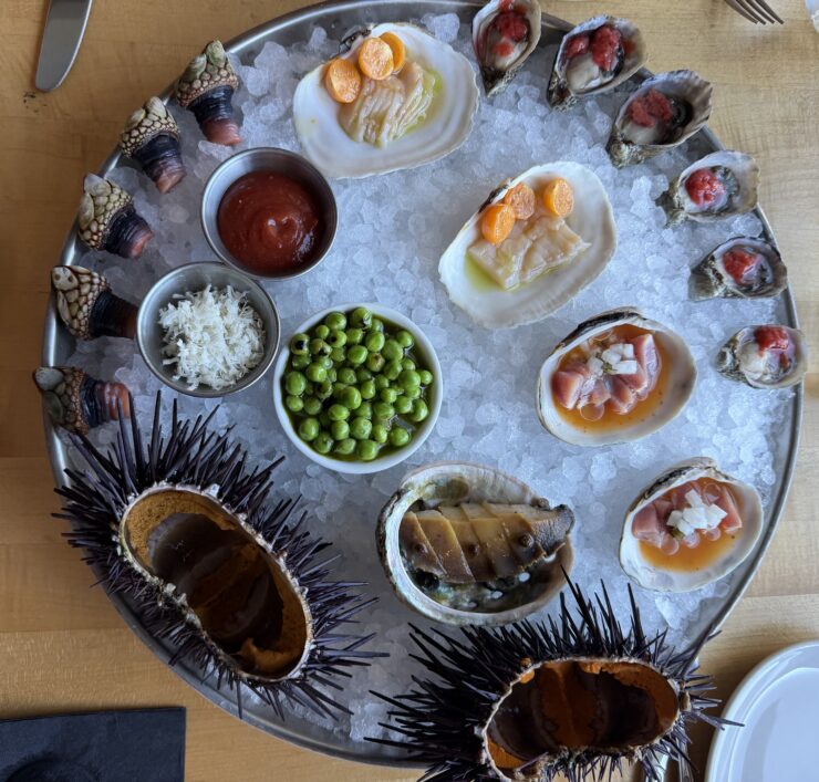 Iced Seafood Platter with Barnacles, Uni, Abalone, Geoduck, Oysters, Clam, Scallops (with Clam Custard and Peas) © Susan Greenberg