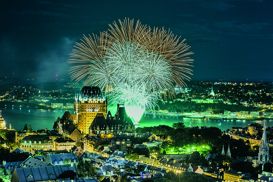 Fireworks over the 132-year-old Fairmont Le Château Frontenac in this image of Old Quebec.