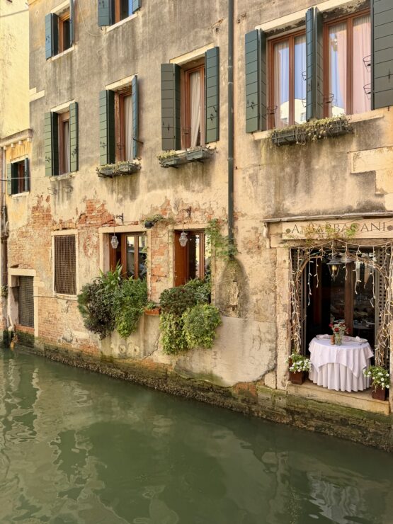 Romantic setting single table on the canal