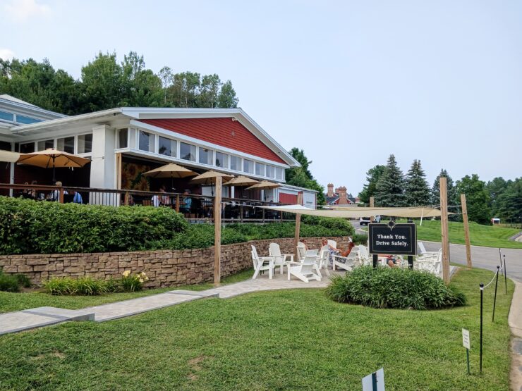 Black Star Farms winery fronted by large lawn and deck chairs