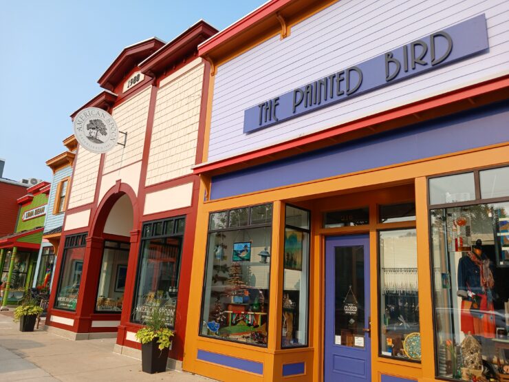 Colorful shops lining Suttons Bay main street